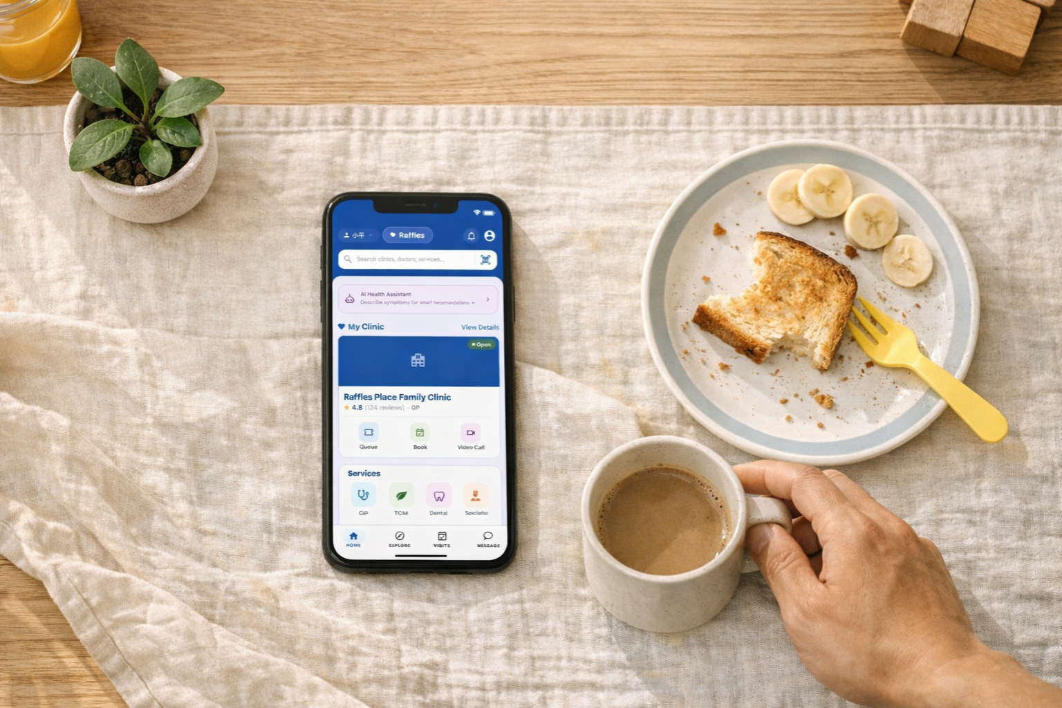 YilaCare app open on a phone beside breakfast on a table at home